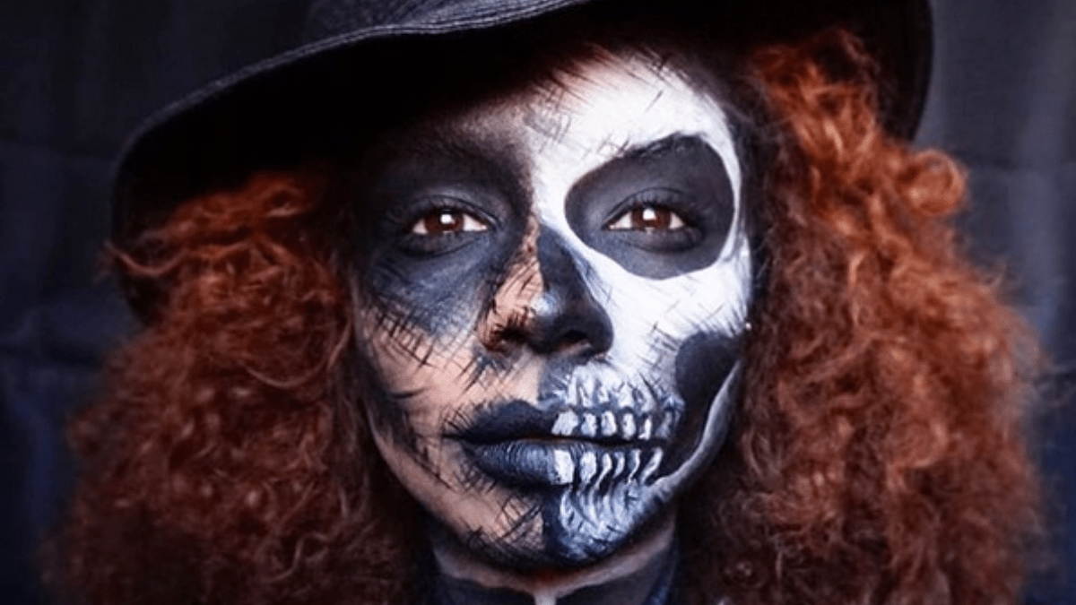 Instagram influencer Christina Vega wearing skull-inspired Halloween makeup
