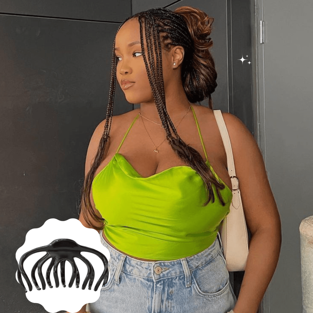 @by.christabelle wearing French curl braids; a few strands left out in front, while the rest is in a claw clip at the back